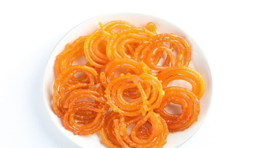 <p><em>Have some piping hot jilipi.</em></p>