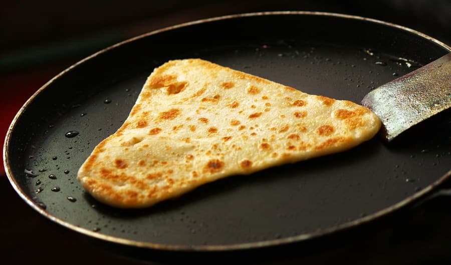 <p>Porota is versatile and can be had with both sweet and savoury delicacies.&nbsp;</p>