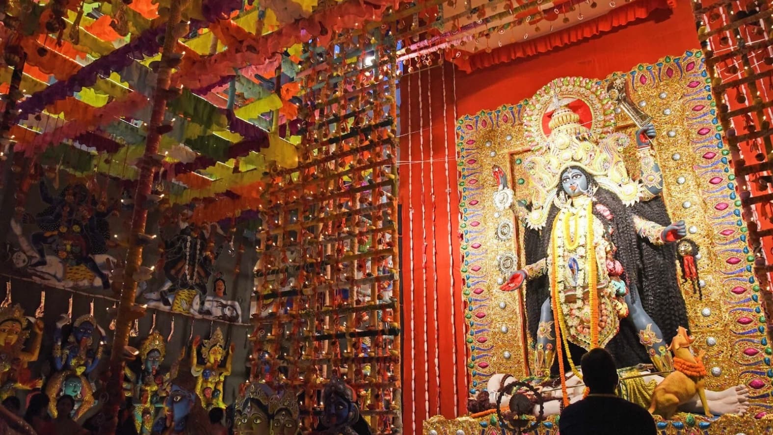 <p>Devotees worship Goddess Kali through rituals and offerings.</p>