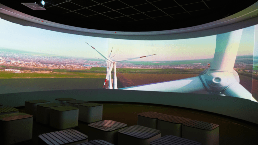 <p>One of the Solar Dome's mini theatres immerses visitors in panoramic films about renewable energy and climate solutions.&nbsp;</p>