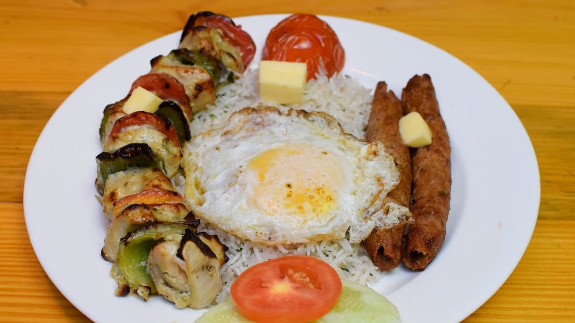 <p>The famous Iranian dish chelo kebab is an example of how Bengal embraces outside influences not by imitation, but by absorption. (Shutterstock)</p>