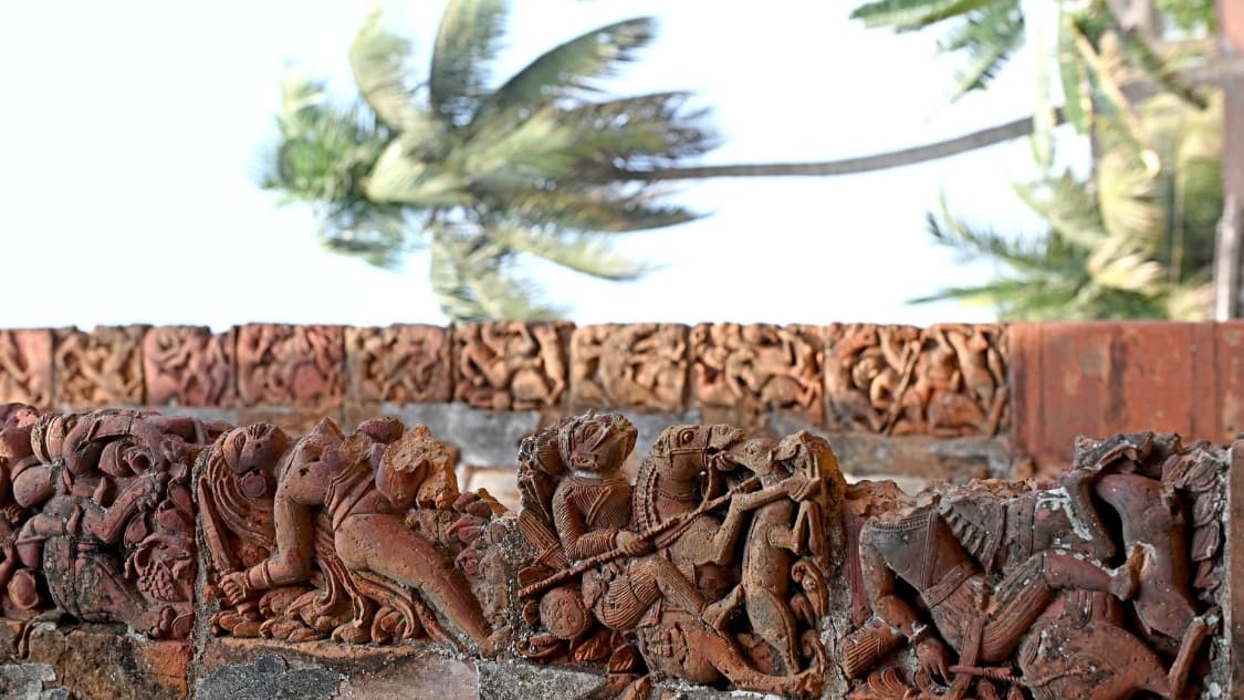 <p>Dedicated to Radha-Krishna, the temple’s terracotta panels depict Krishna-<em>lila.&nbsp;</em></p>