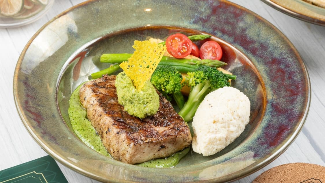 <p>Grilled Bhetki, Panta Bhaat Mousse, Sim Bhaate, Gondhoraj</p>